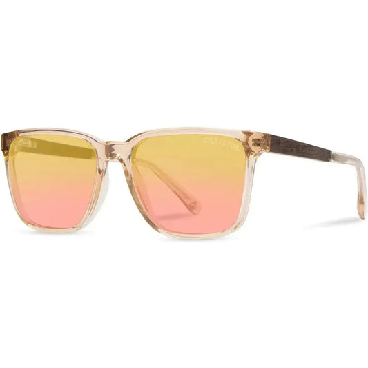 Side view of the Camp Eyewear Crag: Grateful Dead Stealie Edition sunglasses with gradient pink and yellow lenses against a white background.