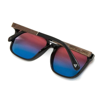 Side view of the Camp Eyewear Crag: Grateful Dead Stealie Edition sunglasses with black frames and Grateful Dead Stealie engraved on the temple against a white background.