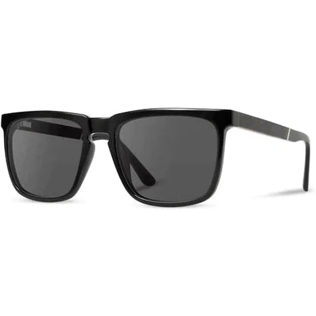Side view of the Camp Eyewear Ridge sunglasses in Black // Ebony with dark lenses against a white background.