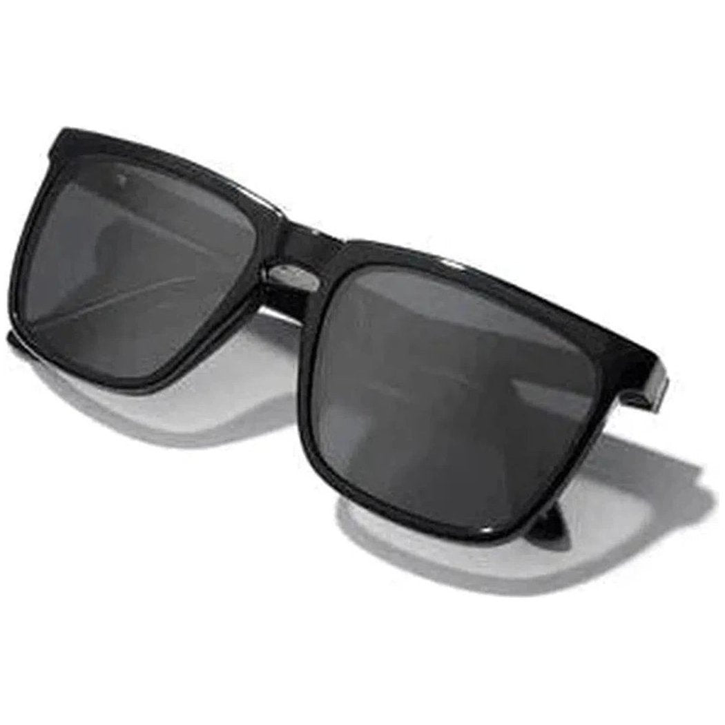 Side view of the Camp Eyewear Ridge sunglasses with black frames and dark lenses against a white background.