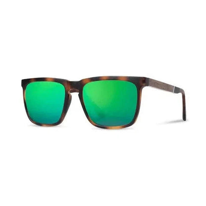 Side view of the Camp Eyewear Ridge sunglasses with black frames and green lenses against a white background.