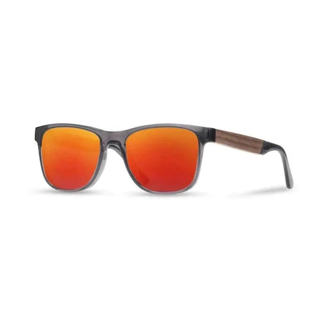 Side view of the Camp Eyewear Trail sunglasses with red lenses and a wooden temple, against a white background.