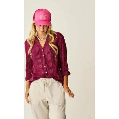 A woman wearing the Carve Designs Women's Dylan Gauze Tunic in Nirvana Stitch stands against a plain background.