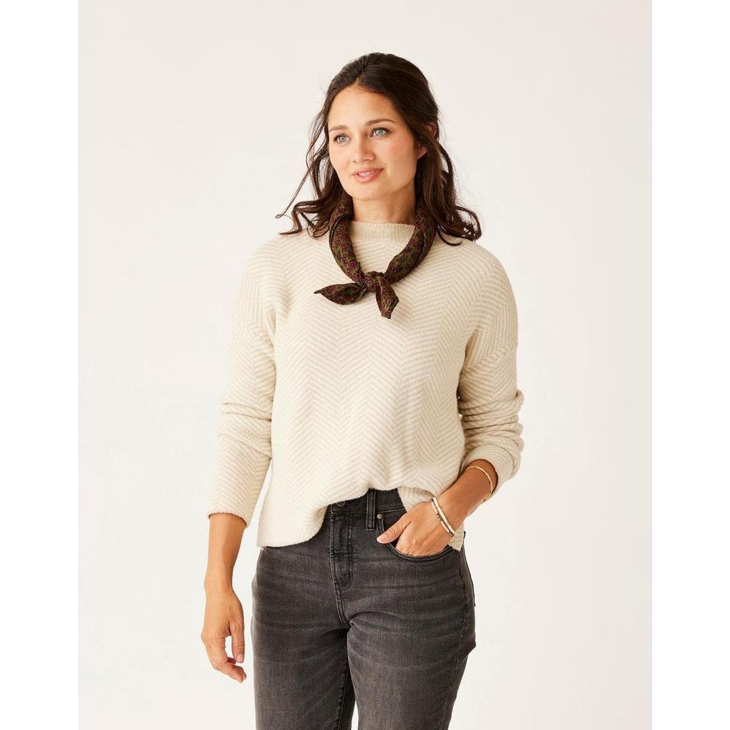 A model wears the Carve Designs Women's Ollvla Plush Sweater in Cement Herringbone against a plain white background.