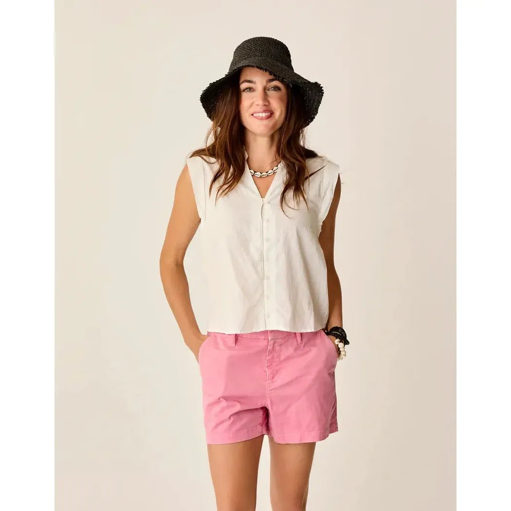 A woman wearing the Carve Designs Women's Reagan Top in Cloud Texture stands against a plain background.