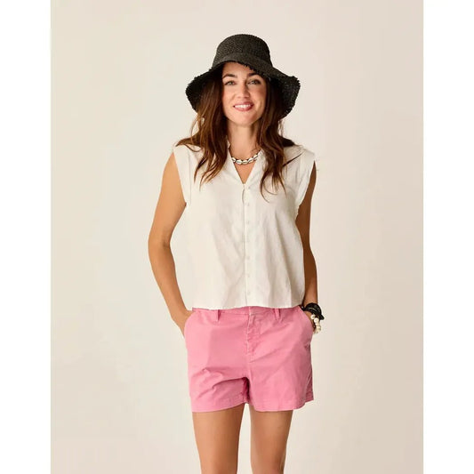 A woman wearing the Carve Designs Women's Reagan Top in Cloud Texture stands against a plain background.