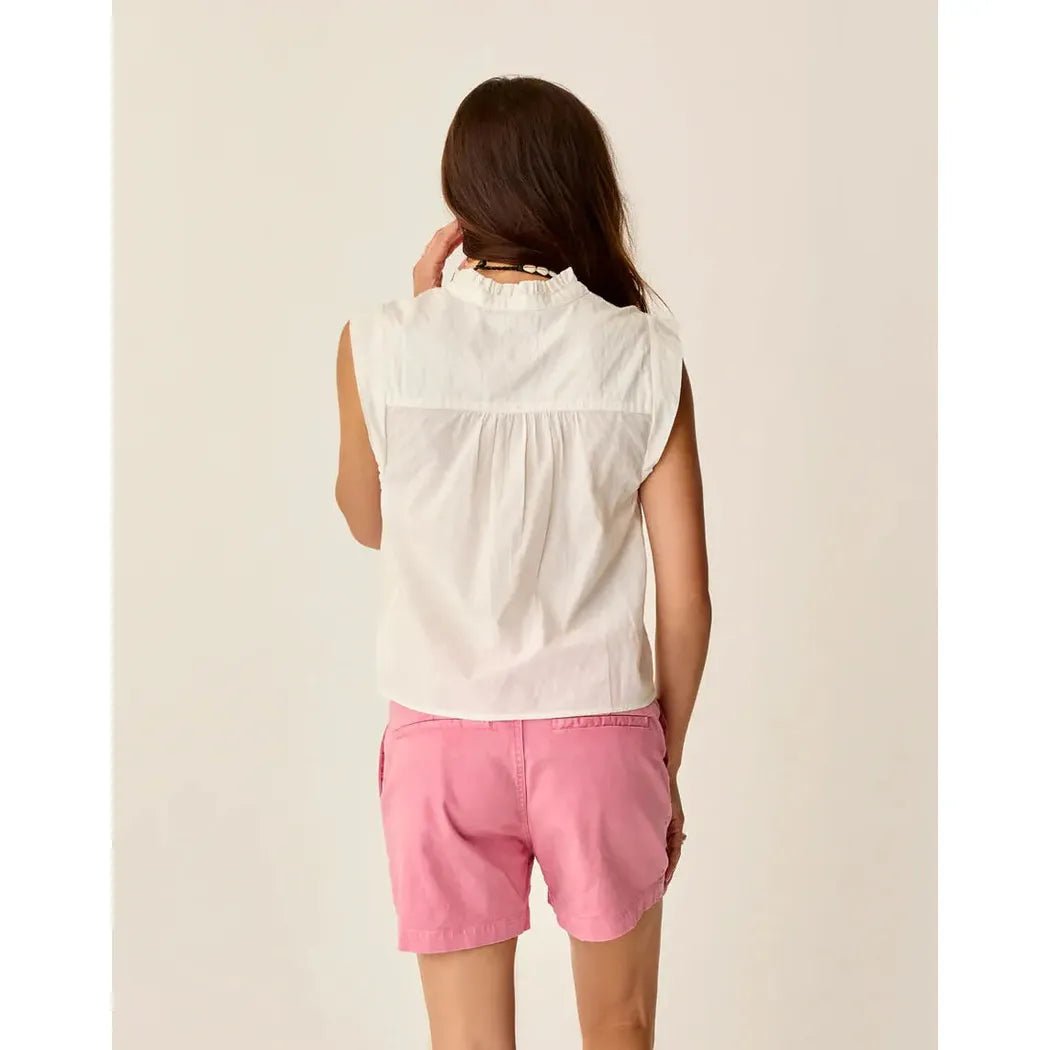 Back view of the Carve Designs Women's Reagan Top in Cloud Texture on a model wearing pink shorts against a plain background.
