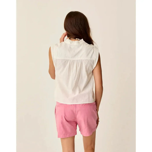 Back view of the Carve Designs Women's Reagan Top in Cloud Texture on a model wearing pink shorts against a plain background.