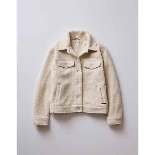 A front view of the Carve Designs Women's Rhea Boucle Trucker in Birch, showing the collar, chest pockets, and button closure against a plain white background.