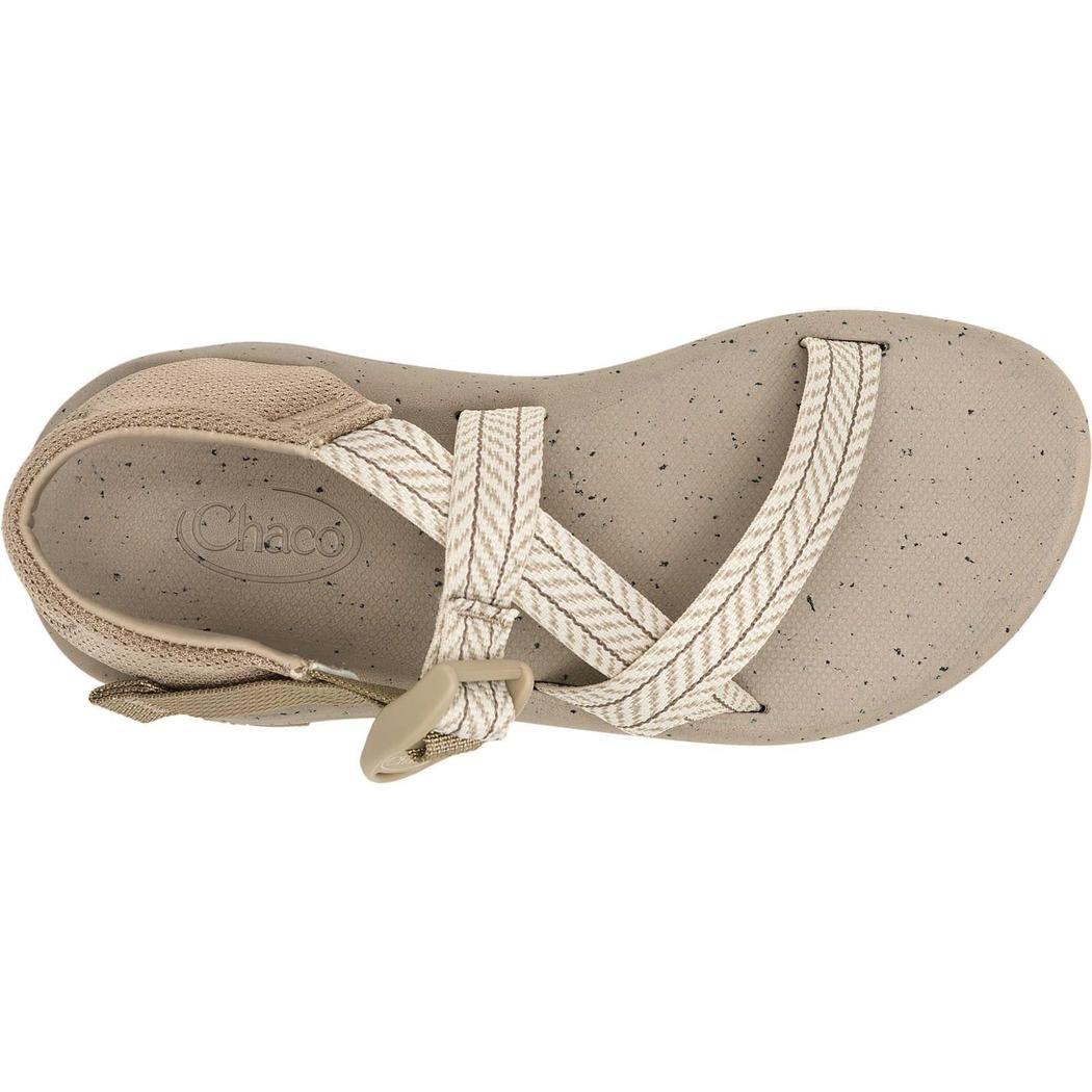 A top-down view of the Chaco Women's Chuhz sandals in Frond Dark Vanilla, showing the crisscross straps and buckle against a white background.