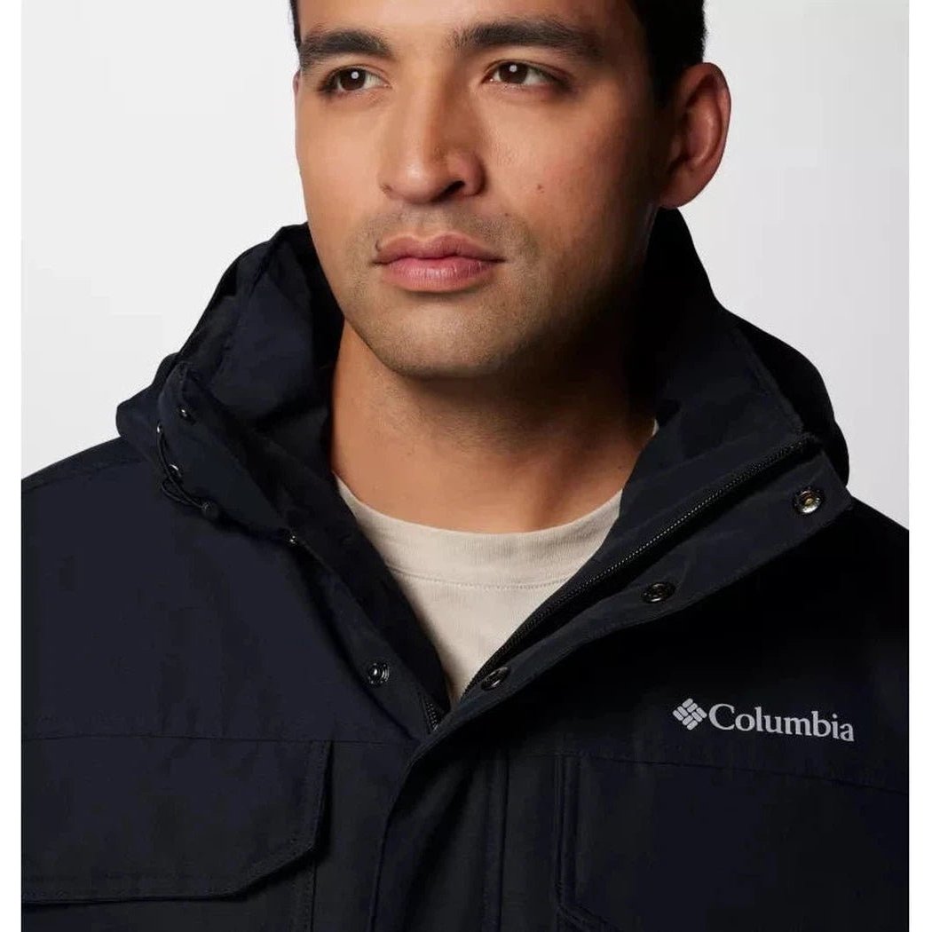 A front view of the Columbia Sportswear Men's Landroamer II Parka in Black, showing the hood and logo on a model against a plain background.