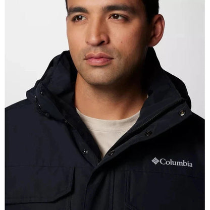 A front view of the Columbia Sportswear Men's Landroamer II Parka in Black, showing the hood and logo on a model against a plain background.