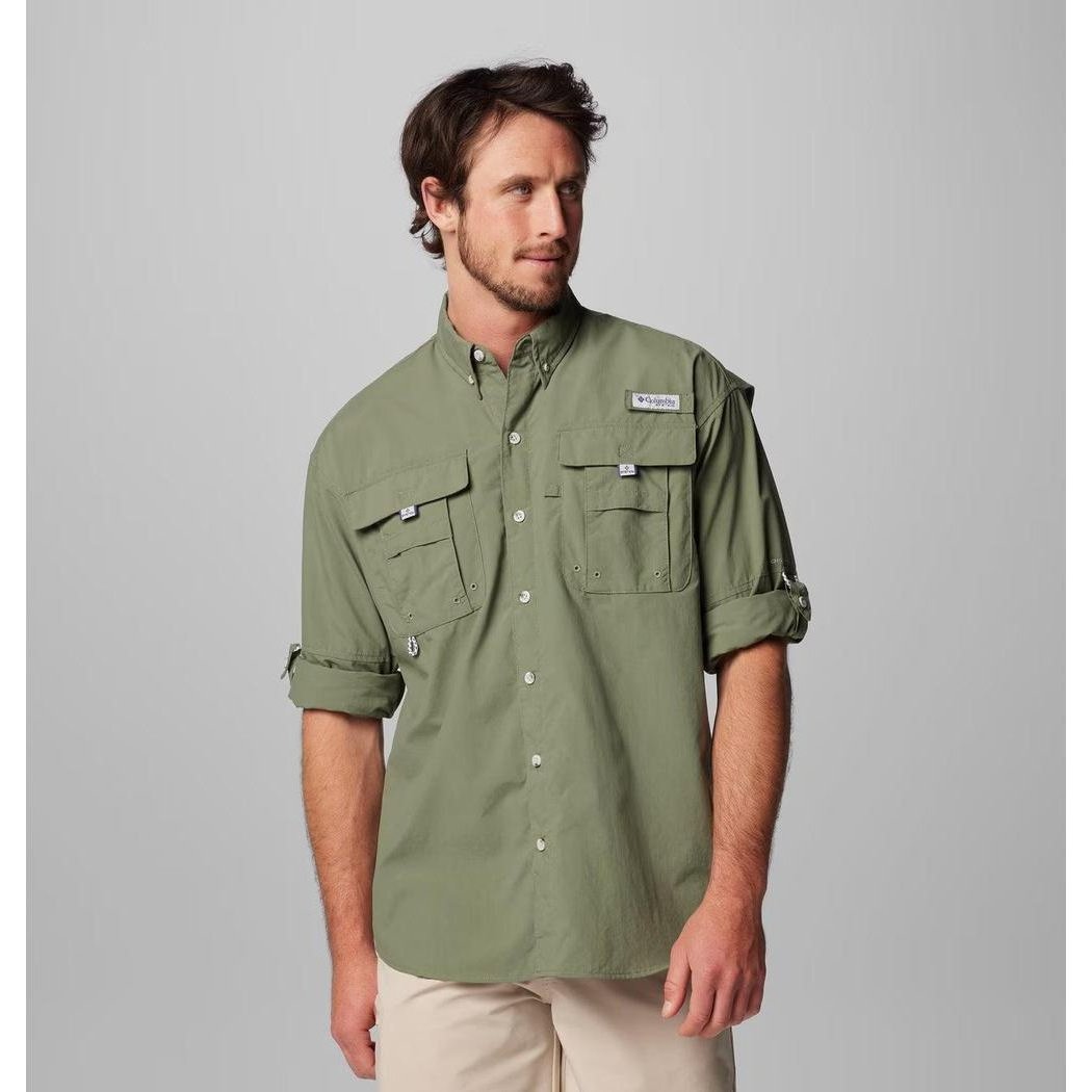 A front view of the Columbia Sportswear Men's PFG Bahama II Long Sleeve Shirt in Fossil, showing the chest pockets and rolled sleeves against a plain gray background.