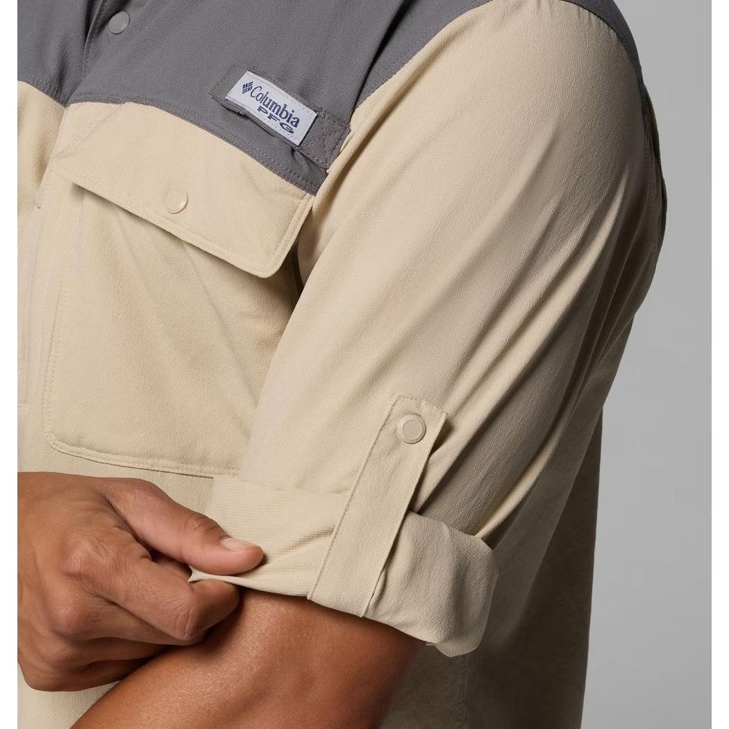 A close-up of the Columbia Sportswear Men's Shoaltech LS Shirt in Ancient Fossil, showing the rolled-up sleeve and chest pocket against a neutral background.