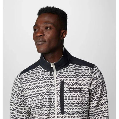 A man in a Columbia Sportswear Men's Sweater Weather Printed Half Zip jacket with a dark collar and a printed pattern, photographed from the front against a plain white background.