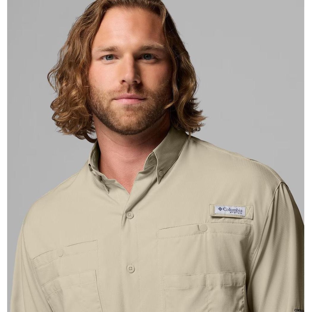 A front view of the Columbia Sportswear Men's Tamiami II Long-Sleeve Shirt in Fossil color, showing the chest pocket and brand tag against a light gray background.