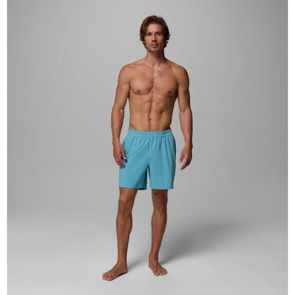 A front view of the Columbia Sportswear Men's Terminal Roamer Stretch Short in Vintage Blue on a model against a gray background.