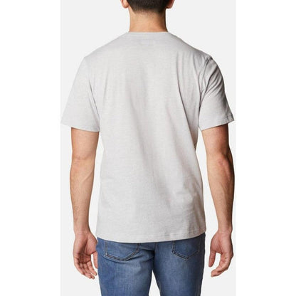 Back view of the Columbia Sportswear Men's Thistletown Hills Short Sleeve in Collegiate, on a model wearing blue jeans against a plain white background.