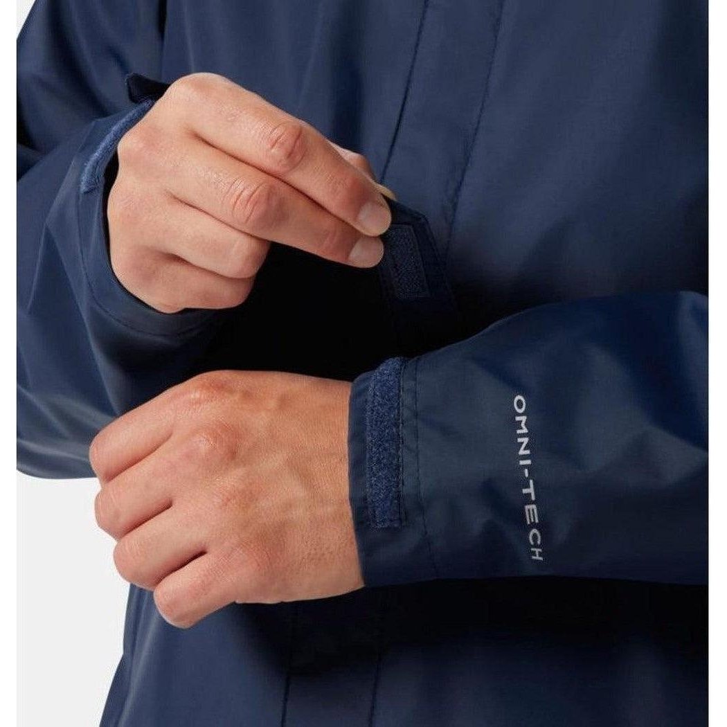 A close-up of the Columbia Sportswear Men's Watertight II Jacket in Collegiate Navy, showing the Omni-Tech cuff detail and a model adjusting the sleeve.