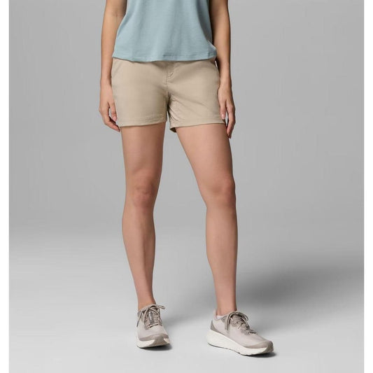 A front view of the Columbia Sportswear Women's Leslie Falls Short II in Ancient Fossil on a model against a gray background.