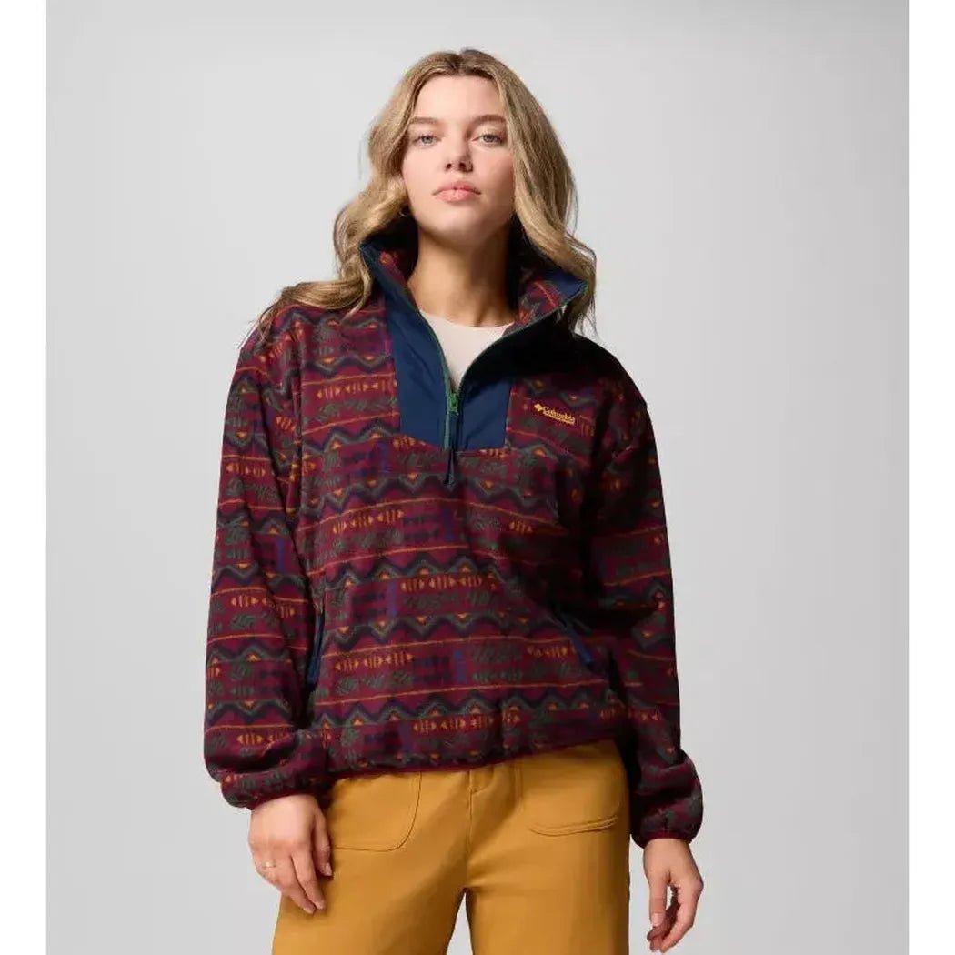 A front view of the Columbia Sportswear Women's Sequoia Grove Printed Half Zip in Rich Wine Horizons on a model wearing tan pants against a light gray background.