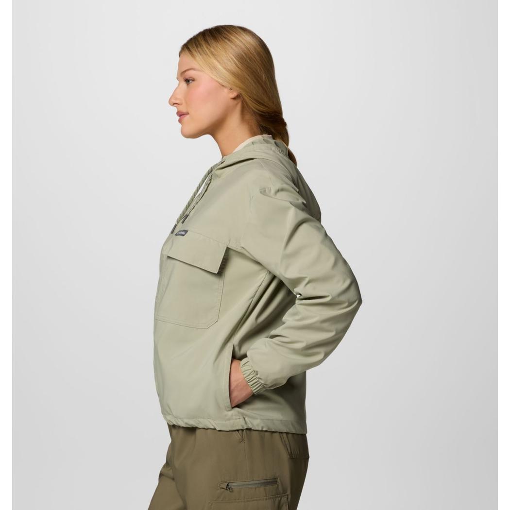 Side view of the Columbia Sportswear Women's Skien Valley Hooded Long Sleeve Shirt in Lavender Pearl showing the chest pocket and model wearing it against a plain background.