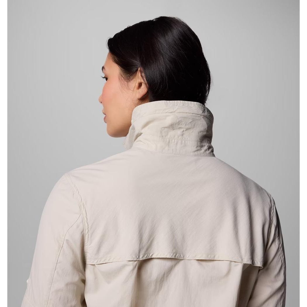 Back view of the Columbia Sportswear Women's Skien Valley Long Sleeve Shirt in Dark Stone, showing the high collar and back panel against a light gray background.
