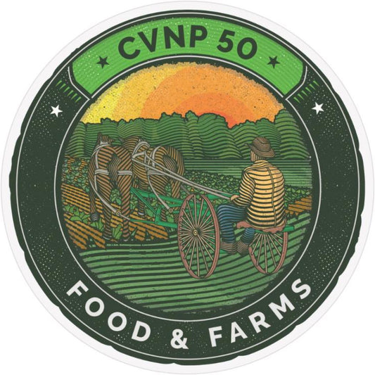 A circular sticker with "CVNP 50" at the top and "Food & Farms" at the bottom shows a farmer on a plow with a horse in a field.