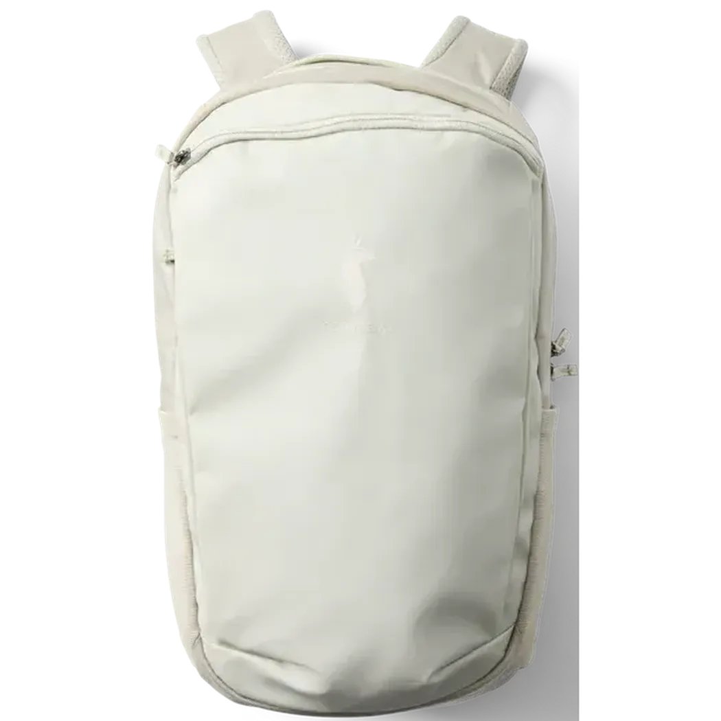 A front view of the Cotopaxi Allpa 18L Daypack in Mineral color with a zippered top pocket and light gray shoulder straps against a white background.