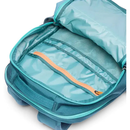 The open Cotopaxi Allpa 26L Daypack in Blue Spruce/Abyss shows its interior pockets and zippers from a top-down angle.
