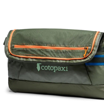A front view of the Cotopaxi Allpa Getaway 55L Duffel in Cotopaxi Black with a mesh top pocket and blue accents against a white background.