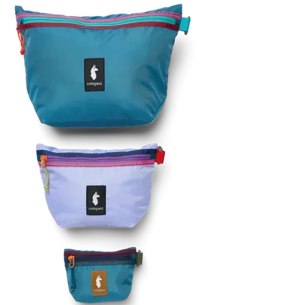 Three Del Dia Cotopaxi Cubo Pouch Organizers in different sizes stacked vertically against a white background.