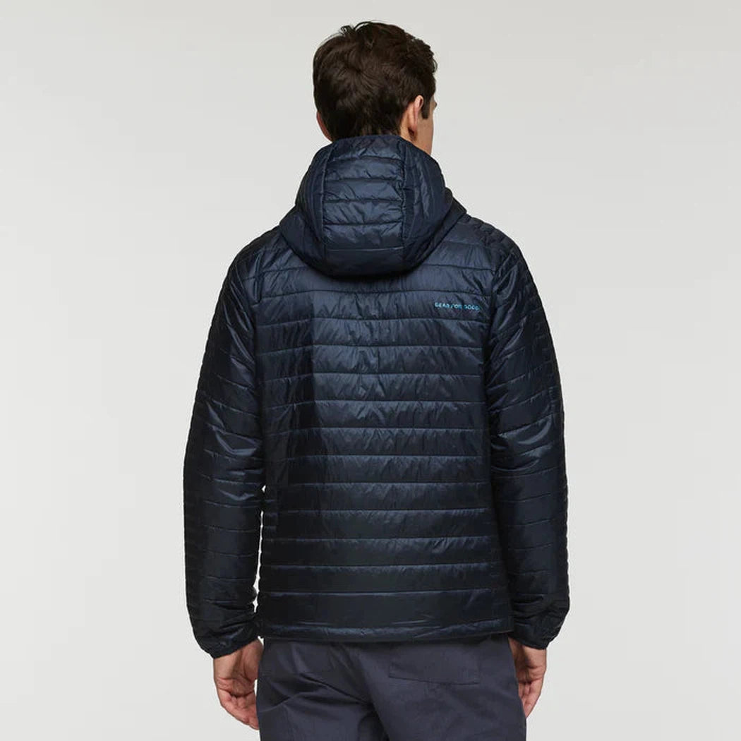 Back view of the Cotopaxi Men's Capa Insulated Hooded jacket in Carbon, showing the hood and quilted design against a plain background.