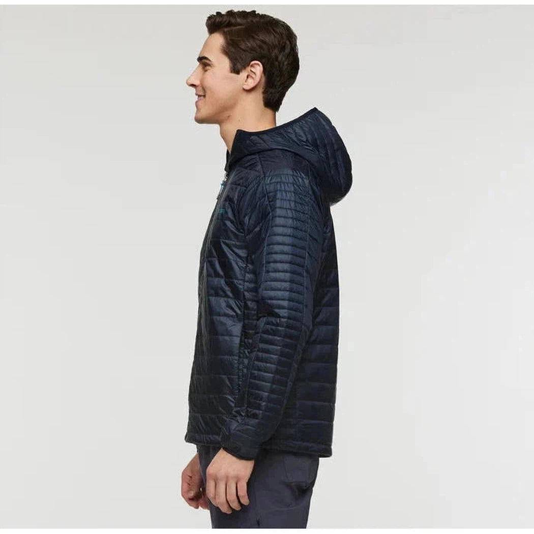 Side view of the Cotopaxi Men's Capa Insulated Hooded jacket in Carbon against a plain white background.
