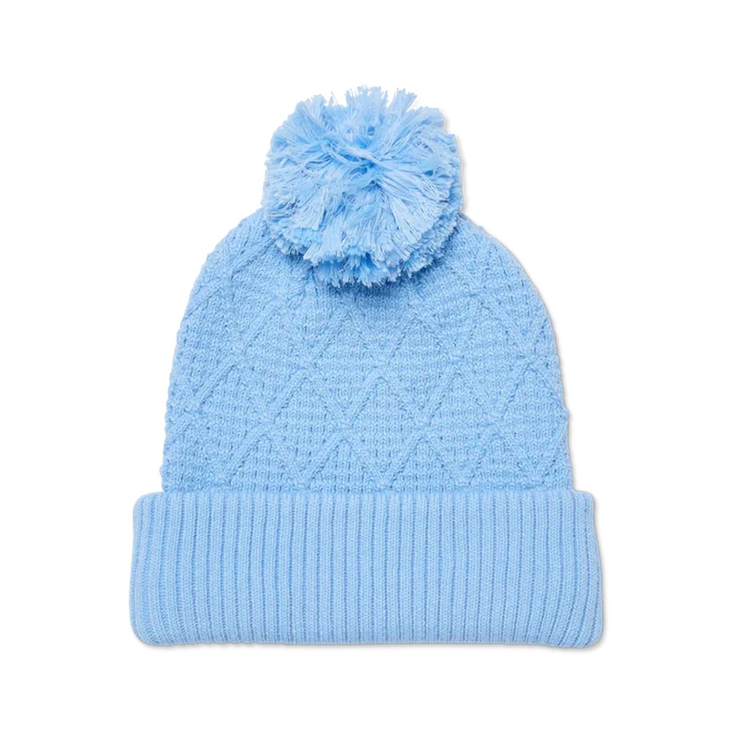 A light blue Cotopaxi Tozo Beanie with a pom pom, shown from the front against a white background.