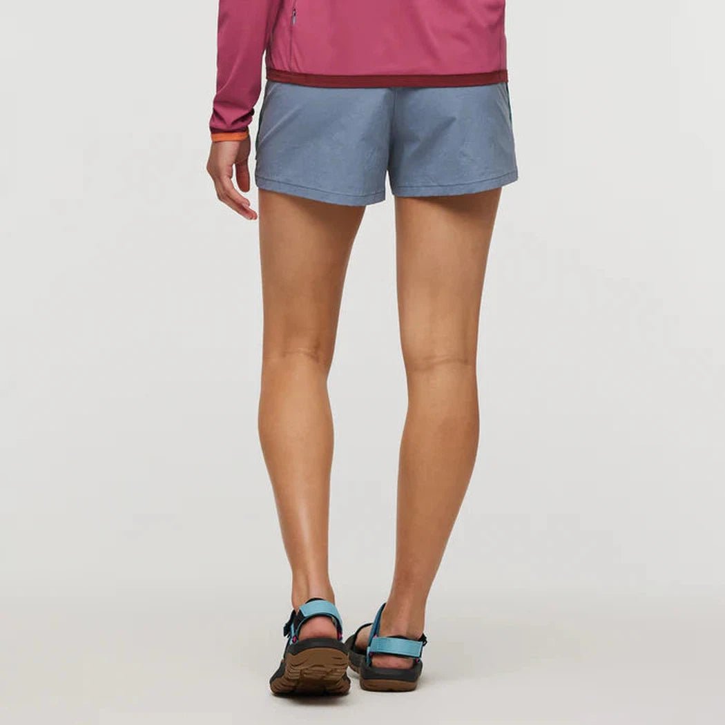 Back view of the Cotopaxi Women's Brinco Short in Tempest showing the model wearing them against a plain white background.
