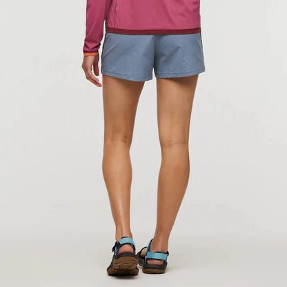 Back view of the Cotopaxi Women's Brinco Short in Tempest showing the model wearing them against a plain white background.