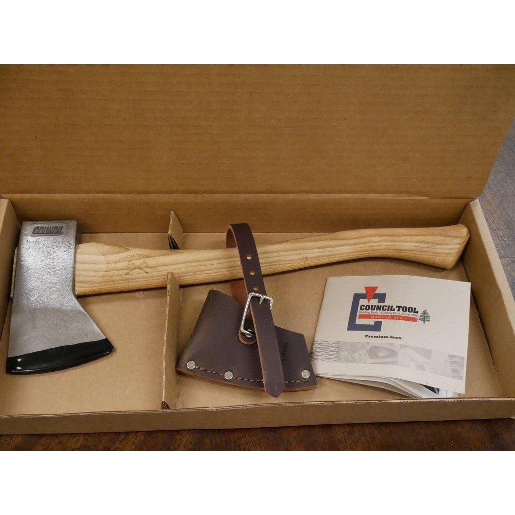 A box containing the Council Tool Co. Velvicut Premium Hudson Bay Bush Craft/Camp Axe with its leather sheath and instruction manual.
