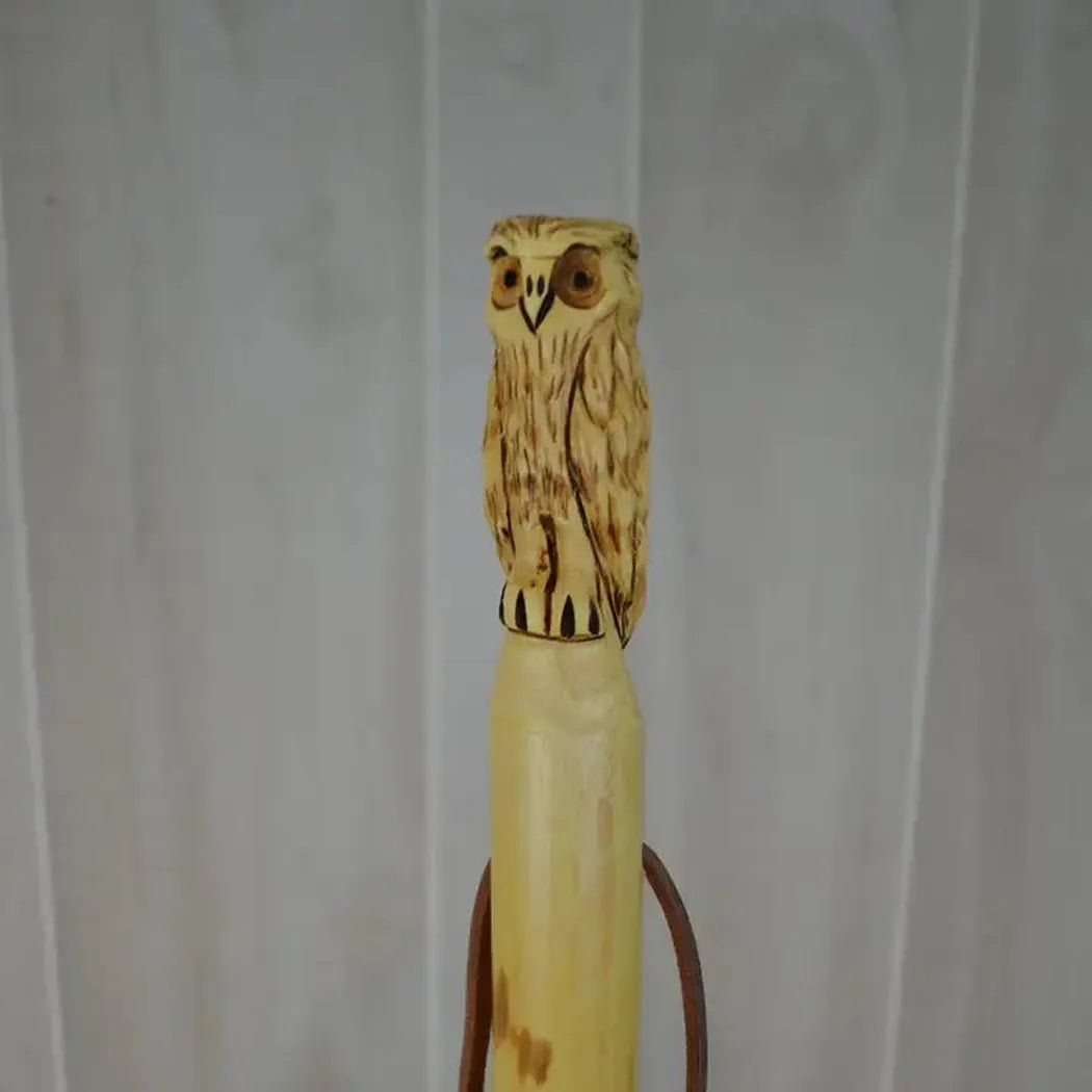 A close-up of the Creation Carvings Walking Stick with Owl Carving against a light gray background.