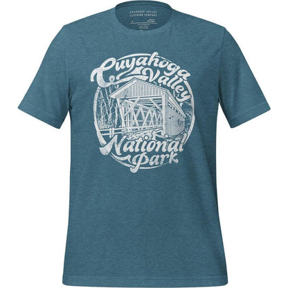 A front view of the Cuyahoga Valley Clothing Company CVNP Covered Bridge T - Shirt in Heather Deep Teal showing the graphic design on the chest.