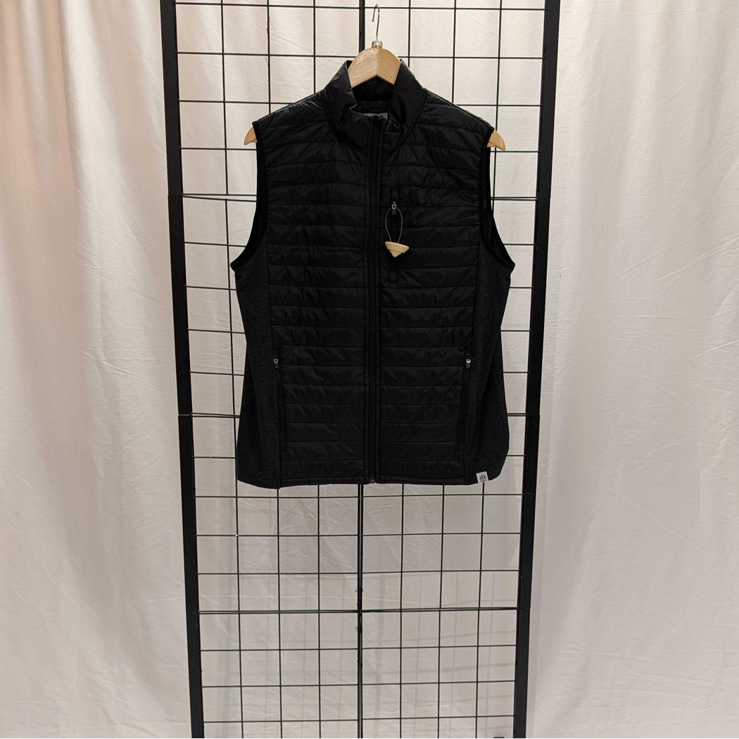 A black Cuyahoga Valley Clothing Company Men's Synthetic Vest hangs on a wooden hanger against a grid background.
