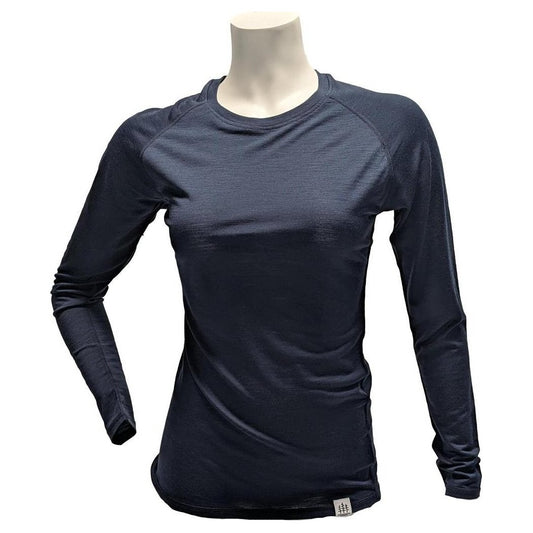 A front view of the Cuyahoga Valley Clothing Company Women's Merino Long Sleeve in Midnight Sail on a mannequin against a white background.