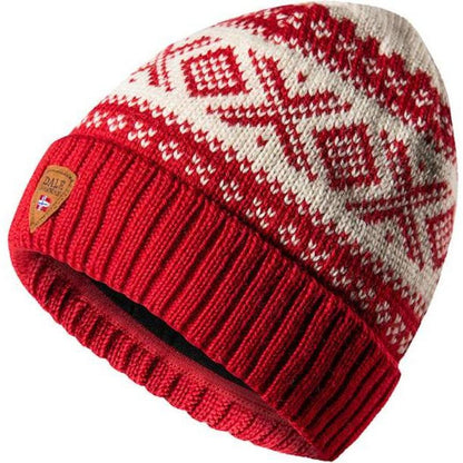 A top-down view of the Dale Of Norway Cortina 1956 Hat in Navy White with a ribbed cuff and patterned body.