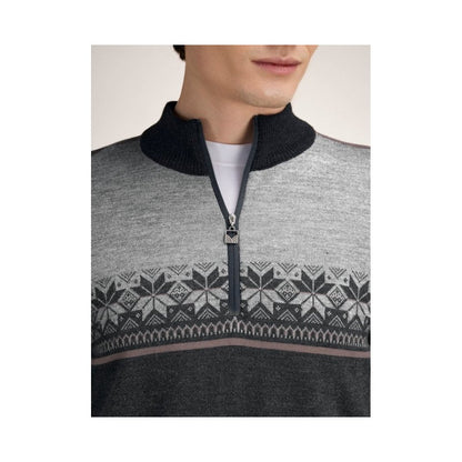 A front view of the Dale Of Norway Liberg Masc Sweater-SAMPLE with a black collar and zipper, snowflake pattern, and dark bottom section.