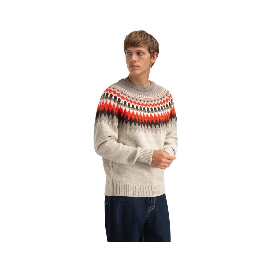 A front view of the Dale Of Norway Losna Masc. Sweater-SAMPLE in BirchVanCoffee on a model wearing dark jeans against a white background.