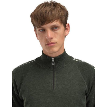 A front view of the Dale Of Norway Men's Geilo Sweater in Darkgreen Offwhite with a half-zip and shoulder accents, on a model against a white background.