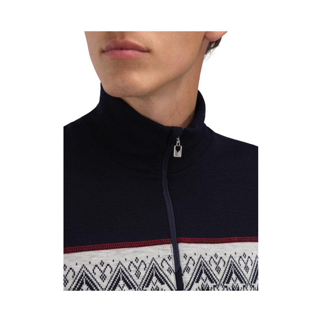 A close-up of the Dale Of Norway Moritz Masc Basic Sweater-SAMPLE in NavyWhtRaspberr, showing the high collar and patterned lower section on a model.