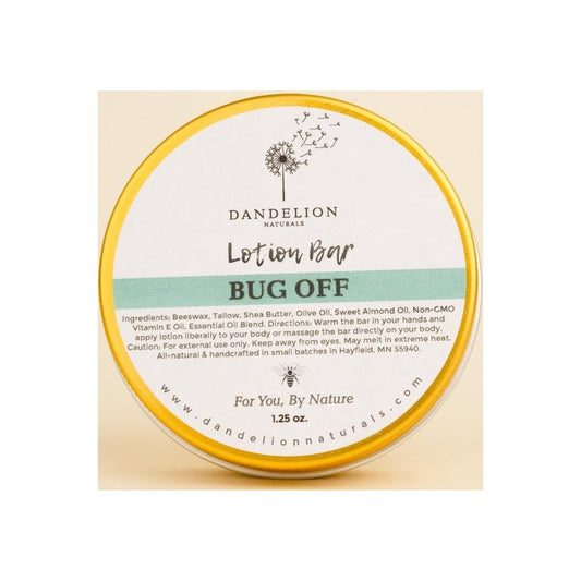A round Dandelion Naturals Lotion Bar in a yellow rimmed tin with a dandelion logo and "Bug Off" text on the label.