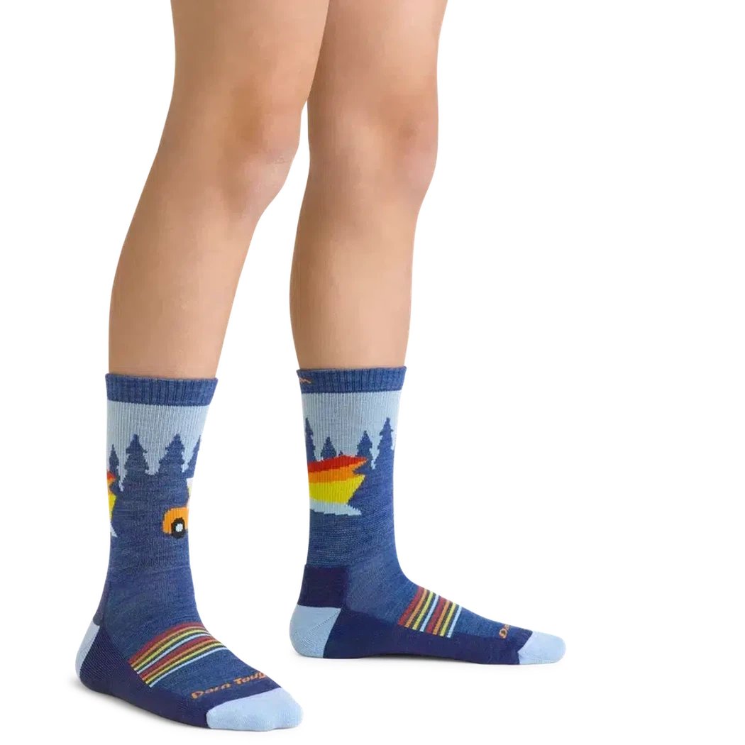 Side view of the Darn Tough Kid's Wild Micro Crew Lightweight with Cushion socks in Denim showing the colorful design on a white background.