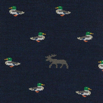 A close-up of the Darn Tough Men's Duck Duck Moose Crew Lightweight with Cushion socks in Eclipse color, showing the moose and duck patterns on a dark background.